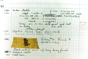 A page from the Harvard Mark II electromechanical computer's log, featuring a dead moth that was removed from the device.